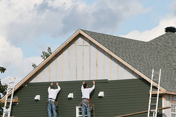 Professional Siding Repair technician working in Bayport, NY